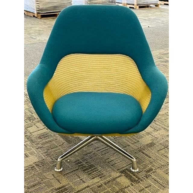 Pre-owned Steelcase Sw_1 Mid Back Lounge Chair Blue fabric with Yellow mesh, and a 4 star Polished Aluminum Base. Features...