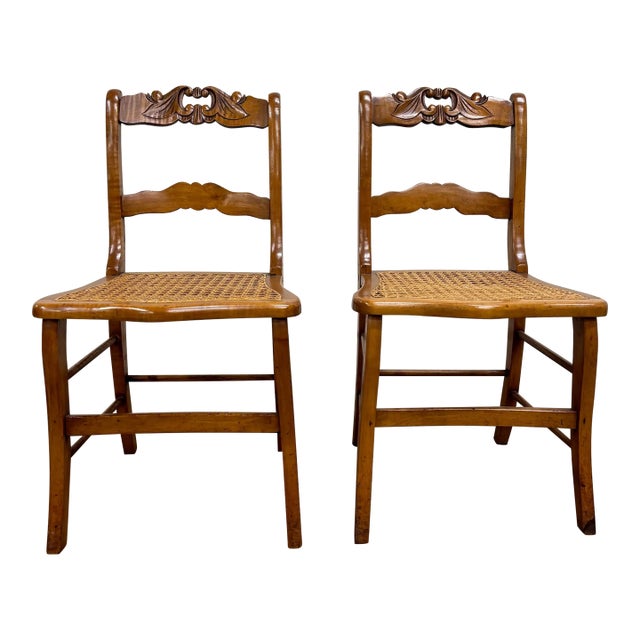 Antique Carved Walnut Ladderback Cane Seat Carved Dining Chairs - Pair For Sale