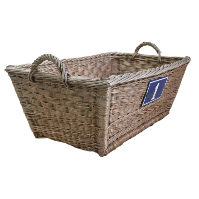 Large vintage French handmade woven wicker and willow market basket with braided rim and handles, sturdy woven bottom, and...