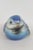 This Baby Blue Bird Figurine is made of porcelain. This Figurine was made in Germany by Goebel, it is stamped, and marked...