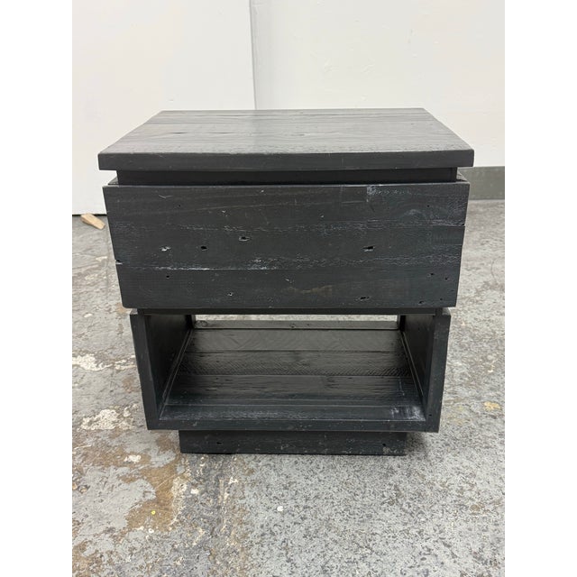 Design Plus Gallery presents the Plank Wood Nightstand from West Elm. The rectangular wood case displays visible grain,...