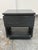 Design Plus Gallery presents the Plank Wood Nightstand from West Elm. The rectangular wood case displays visible grain,...