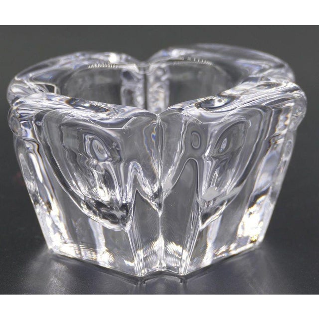 This vintage crystal vase is a decorative crystal object designed by Alvar Aalto and manufactured by the Swedish Companies...