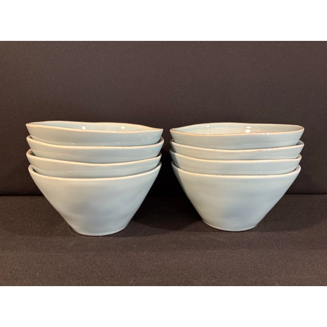Welcome the morning with this set of eight light blue cereal bowls in the Marin pattern from Crate and Barrel. Their...