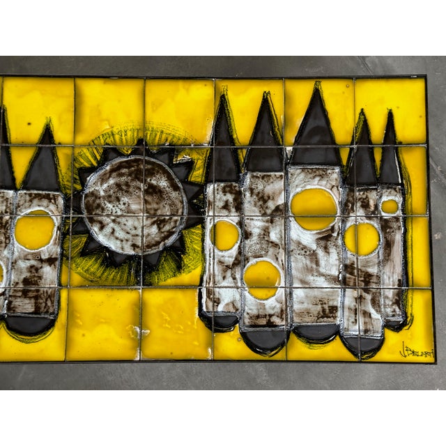 This stunning mid-century coffee table, crafted by the renowned Belgian designer Juliette Belarti, is a true work of art....