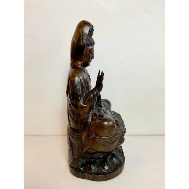 1950s Carved Rosewood of Quan Yin. Hand carved and painted. This item contains material that cannot be shipped outside of...