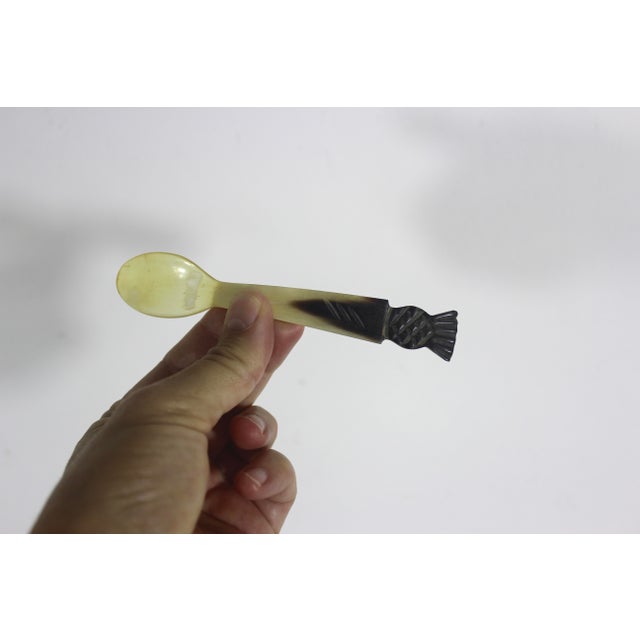 Vintage hand carved horn spoon with a Scottish thistle on the handle (I think they look like pineapples). Excellent...
