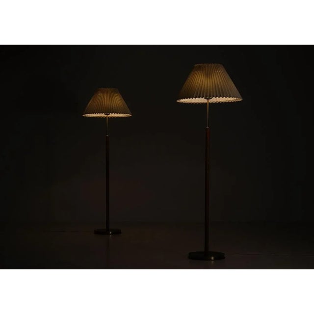 Pair available. Designed by Josef Frank, model 2148, produced by Svenskt Tenn. with 4 lights each, controlled with two...