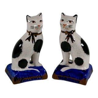 Pair of Vintage English Staffordshire Style Black & White Cat Figurines on Blue Pillows For Sale