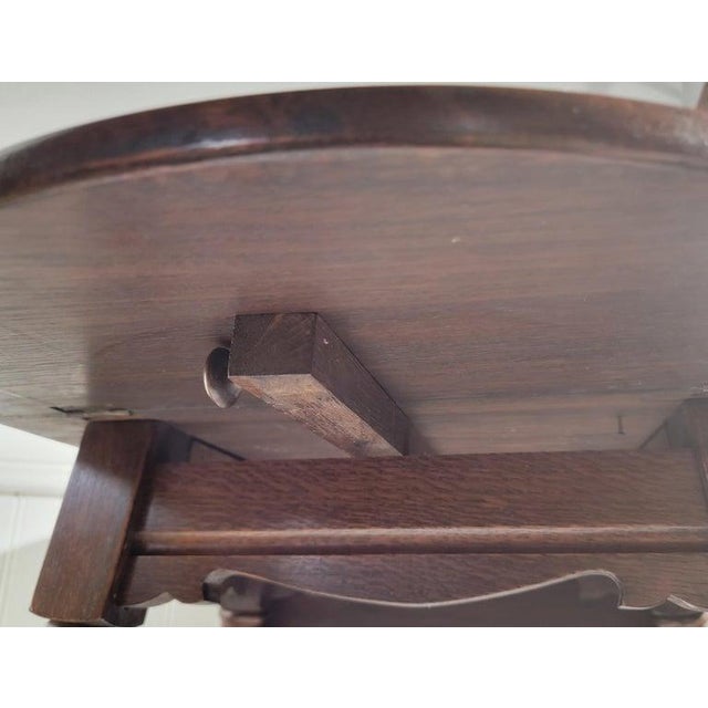 This fine hand crafted arts & crafts oak side drop leaf table is in fine condition.It is very sturdy & has an amazing aged...