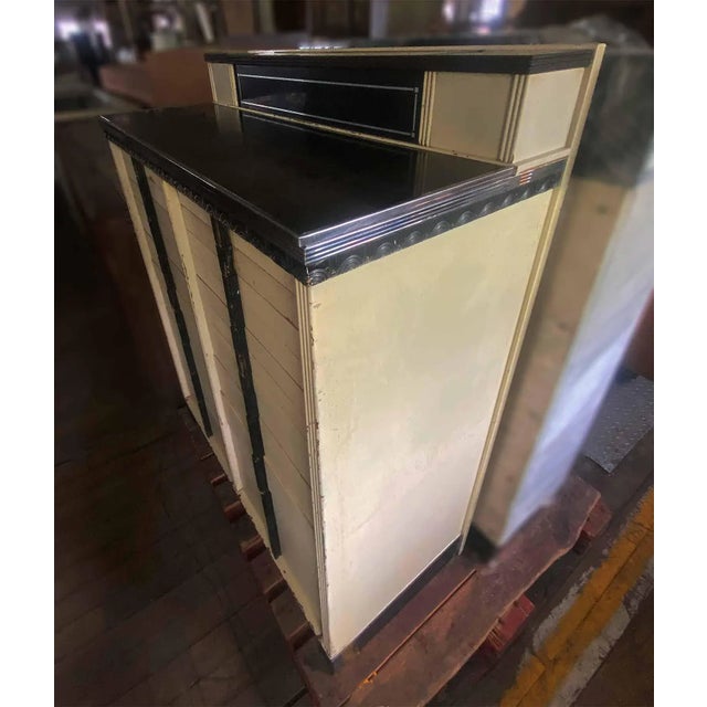 Antique Art Deco style dental cabinet. Many drawers, some have milk glass trays. Flip top compartments on top level. Made...
