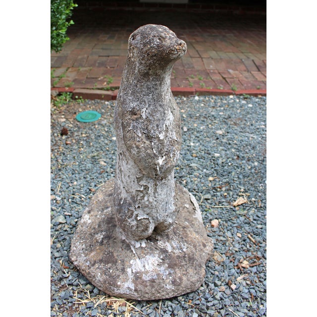 Mid-20th century cast stone standing otter garden ornament, English. Delightful face - he looks like he just came out of...