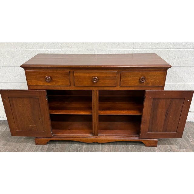 This is a vintage American Traditional or American Country style mahogany buffet or sideboard, likely dating to the...