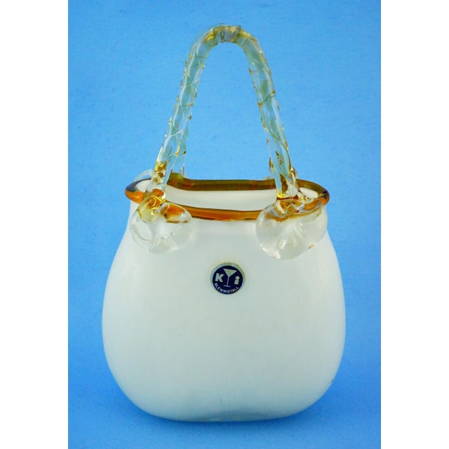 Measurements: height: 19.5 cm; width: 12 cm; depth: 5.5 cm; weight: 0.558 kg item : a refined vintage glass vase shaped...
