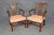 This handsome and extensive set of mahogany dining chairs, dating from the 1950s and executed in the Chippendale Georgian...