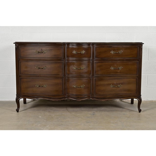 An exceptional French Provincial Louis XV style nine-drawer dresser or credenza In the Manner of Jacques Bodart USA, Circa...