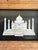 Intricately carved and painted mosaic in handmade wood frame.