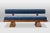 A 3-seater bench in light ash, upholstered in glacier blue mohair velvet. The seat consists of 3 cushions housed in a box...