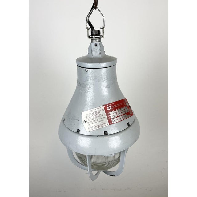 Industrial explosion proof light made by Crouse-Hinds in United States during the 1970s. It features a cast aluminium body...