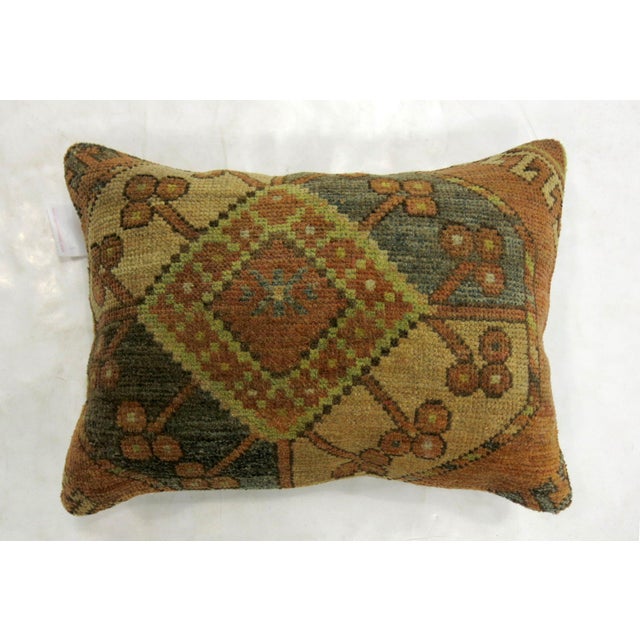 Pillow made from a 19th-century antique Ersari rug with cotton back and zipper closure. Measures: 14'' x 21''