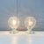 German-made lighting set in a timeless mid-century design with a charming vintage flair. The lights shine with textured...