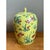 This ginger jar commands attention through its saturated yellow ground and lively hand-painted aquatic scene, its rounded,...