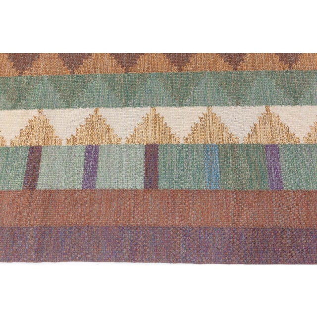 Vintage Swedish flat weave rug signed with Initials (IV) Size: 6'4" × 9'1" (193 × 276 cm) This captivating vintage Swedish...