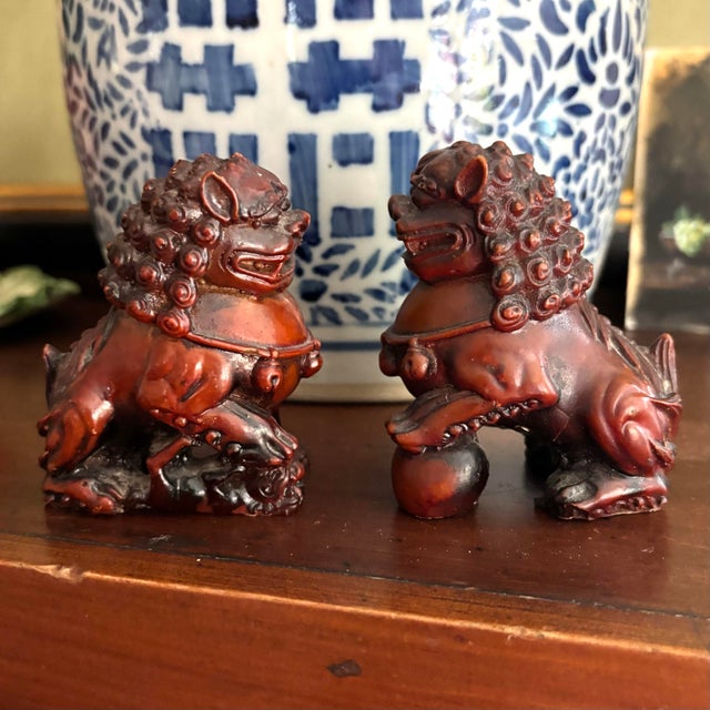 Vintage oxblood red Foo Dogs, made of resin. Foo Dogs or Imperial Guardian Lions are strong feng shui protection symbols....
