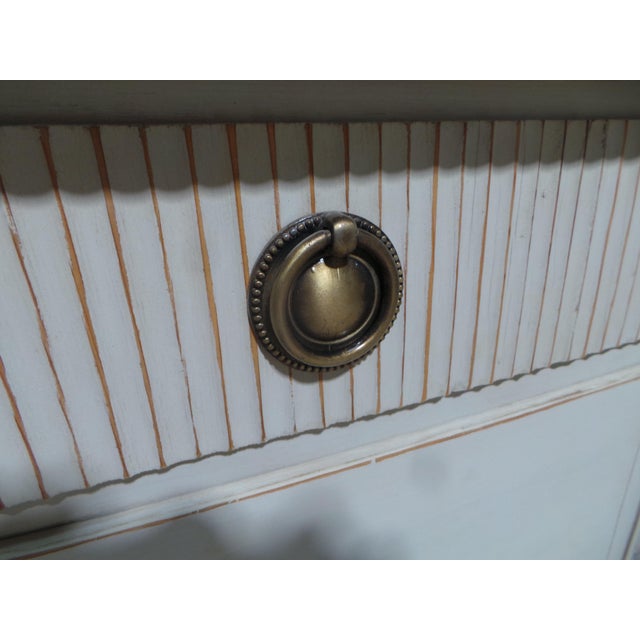 This is a unique 4 drawer Swedish Gustavian style chest of drawers