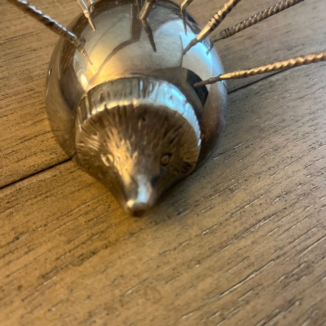 Vintage appetizer stick holder in sterling silver hedgehog includes 10 sticks. Sticks have detail as well as the hedgehogs...