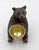 Late 19th century Black Forest seated bear with bowl, Swiss. Sweet seated bear holding a brass lined copper bowl for...