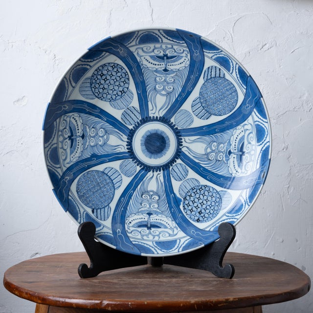 A Japanese Edo period blue and white charger, circa 1800. 17 ½ inches wide by 3 inches tall