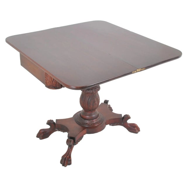 American late federal/empire mahogany fold-over tea/games/card table, circa 1830. The table having a fold-over & swivel...
