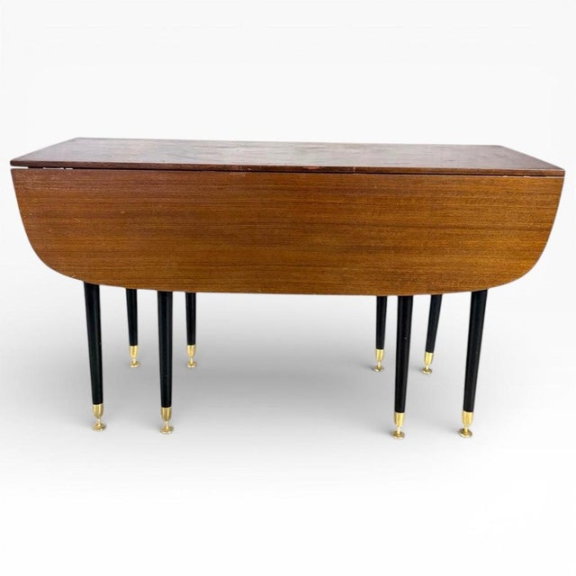 The g plan dining table is a stunning mid century dining table that combines style and practicality for any retro dining...