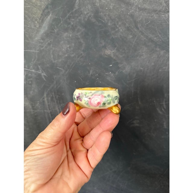 Set of 5 Bring a touch of Victorian charm to your table with this lovely set of hand-painted porcelain salt cellars. Each...