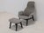 Designed with an ergonomic high-back profile, the armchair offers exceptional head and neck support, complemented by...