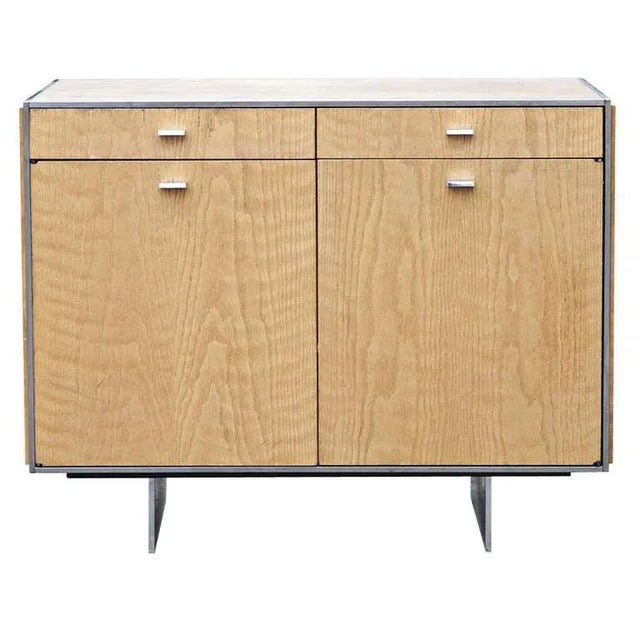 A small vintage oak credenza designed by Davis Allen and from the Davis Allen Collection for GF. Drawers include three...