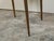 An Italian brass coffee table from the mid 20th century, with marble top and tapered legs. Created in Italy during the...