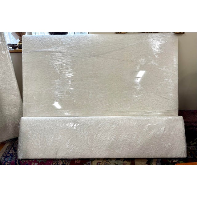 Sink into the embrace of soft wool bouclé upholstery, accented by a minimalist silhouette that channels California cool...