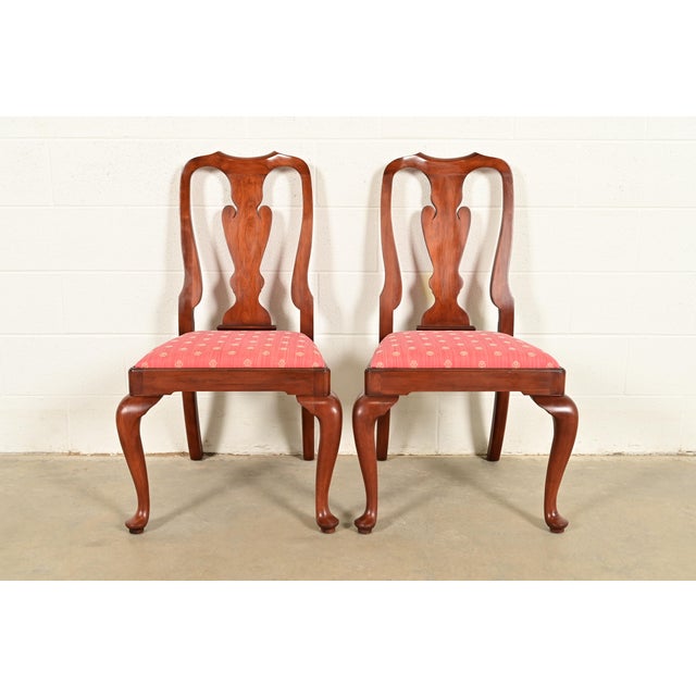 An outstanding pair of Queen Anne or Georgian style side chairs or dining chairs By Henkel Harris USA, Circa 1970s Solid...