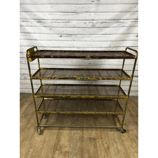 Metal industrial rack from a shoe factory made in the 30s