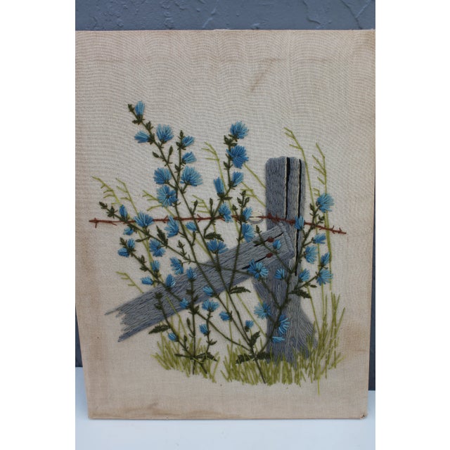 Vintage Handmade Yarn Wall Art. Fence, barbed wire with wild flowers motif.