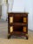 Antique Asian cabinet with compartments. Brass corner reinforcements, handles and decorative detail. The doors and back of...