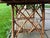 Adirondack lodge style handcrafted rustic twig accent table. Constructed from natural branches with a slatted top and...