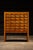 Vintage freestanding blonde oak library card catalog with attached leg supports, likely from the 1950s. Previous ownership...