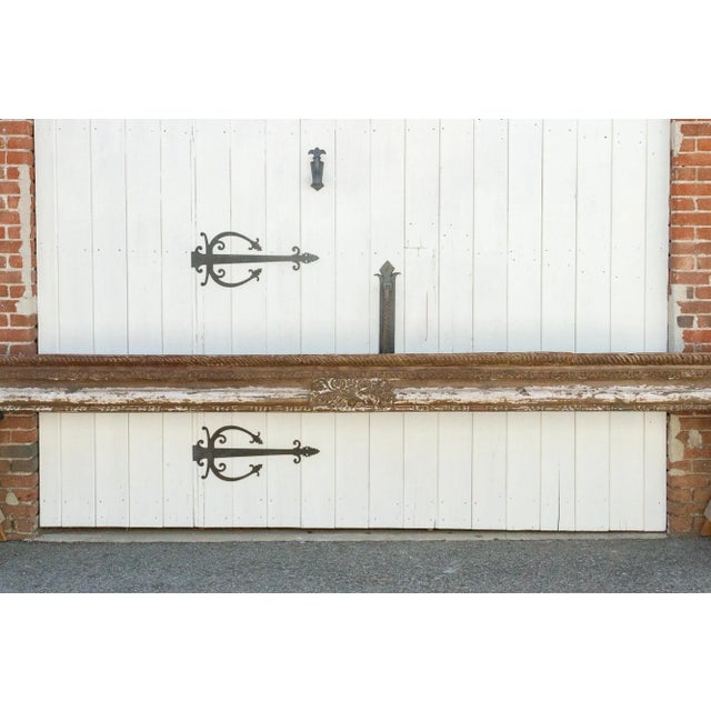 An architectural gem, this elegant antique carved beam is and is hand carved from teak wood and is adorned with beautiful...