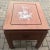 Handsome side table with mother-of-pearl inlay. The hand-made inlay depicts a bird on a flower branch. There are mixed...