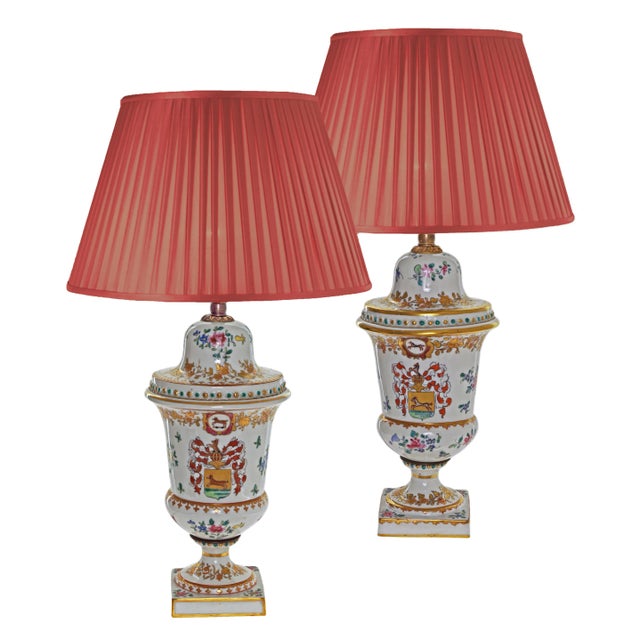 Elegant pair of porcelain armorial urns mounted as lamps. They are clearly marked with the red Samson mark and "Made in...