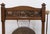 Arts & Crafts Movement oak floor standing dinner gong with stylised sinuous copper panel. Attributed to Shapland And...