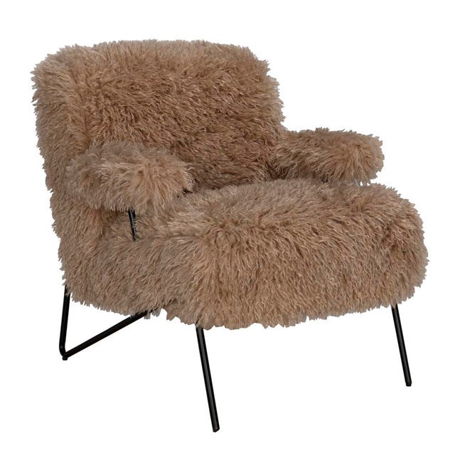 Modern comfort meets playful texture in the Exeter Lounge Chair. Wrapped in ultra-soft latte vegan fur and grounded by a...
